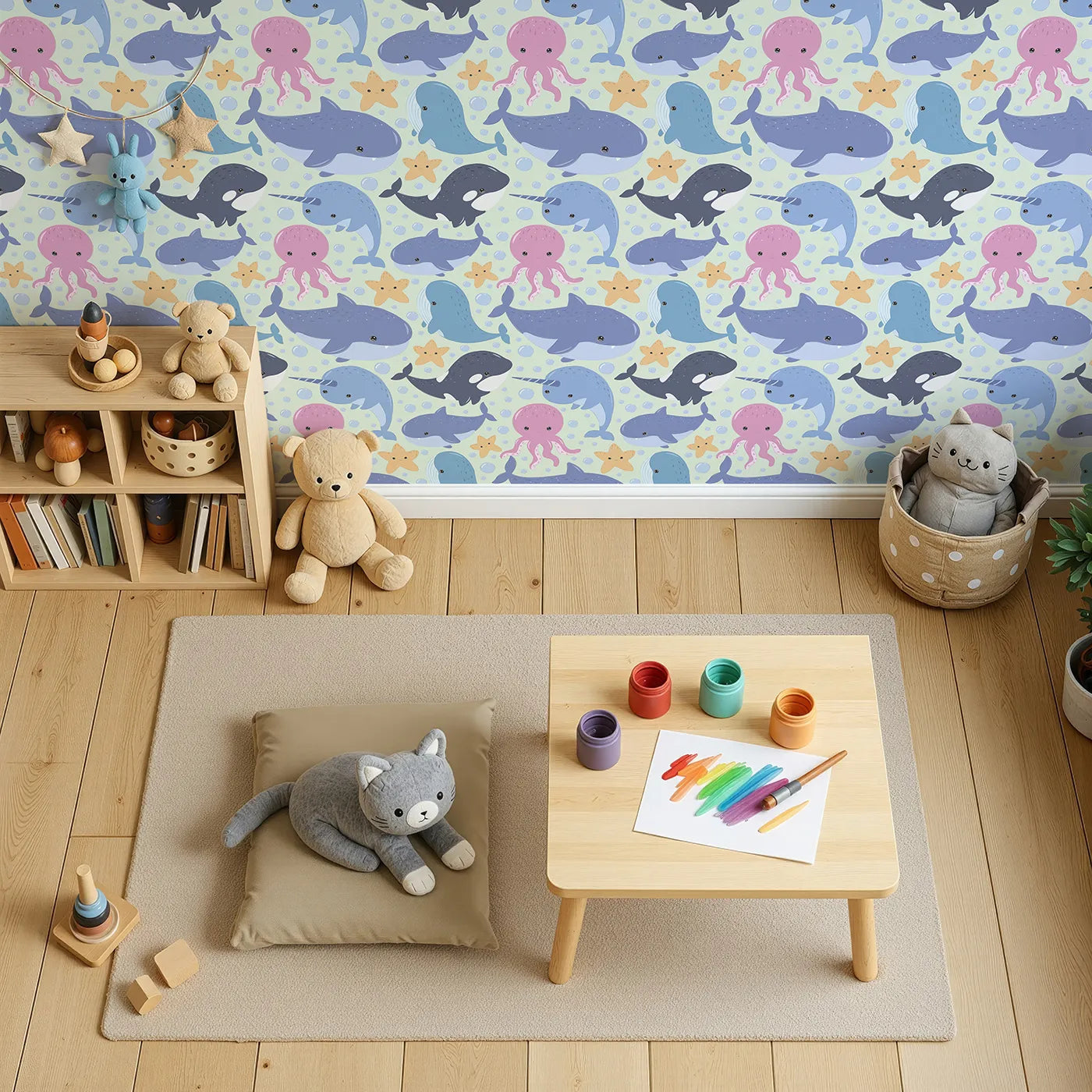 Top-Down view of Whimsy Tots' Ocean Buddy Parade Wallpaper in Mint Green (W3046D).Playful whales and gentle friends float through a minty sea of smiles.
