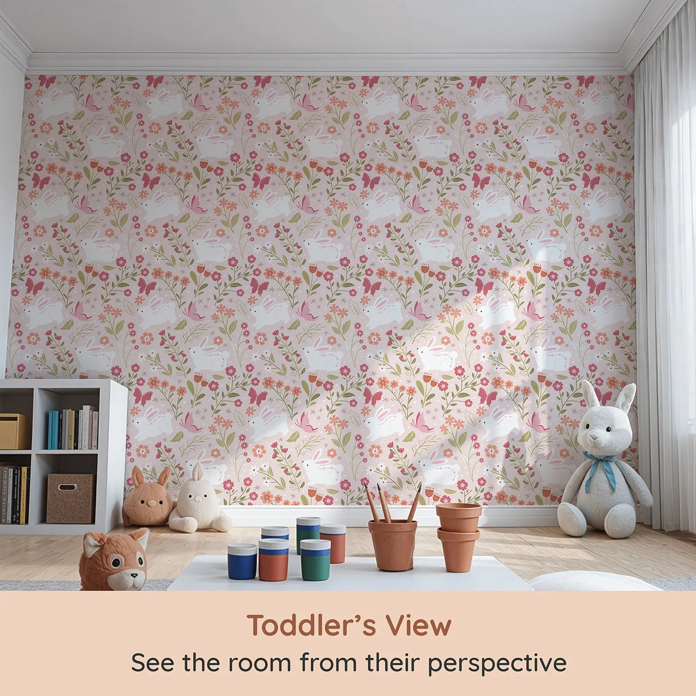Whimsy Tots Meadow Hops Bunny Wallpaper in Blush Pink (W3047A) from your child's view.Bunnies leap among flowers and butterflies in a dreamy spring meadow.