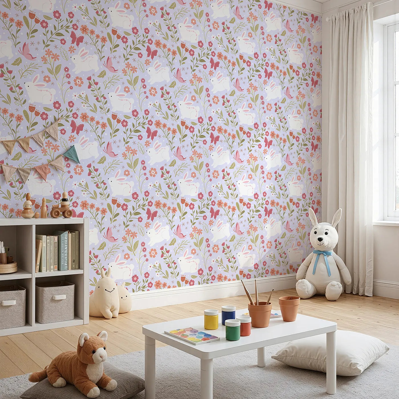 Angled view of Whimsy Tots' Meadow Hops Bunny Wallpaper in Lilac Lavender (W3047E).White bunnies hop among coral blooms and butterflies in a dreamy lilac garden.