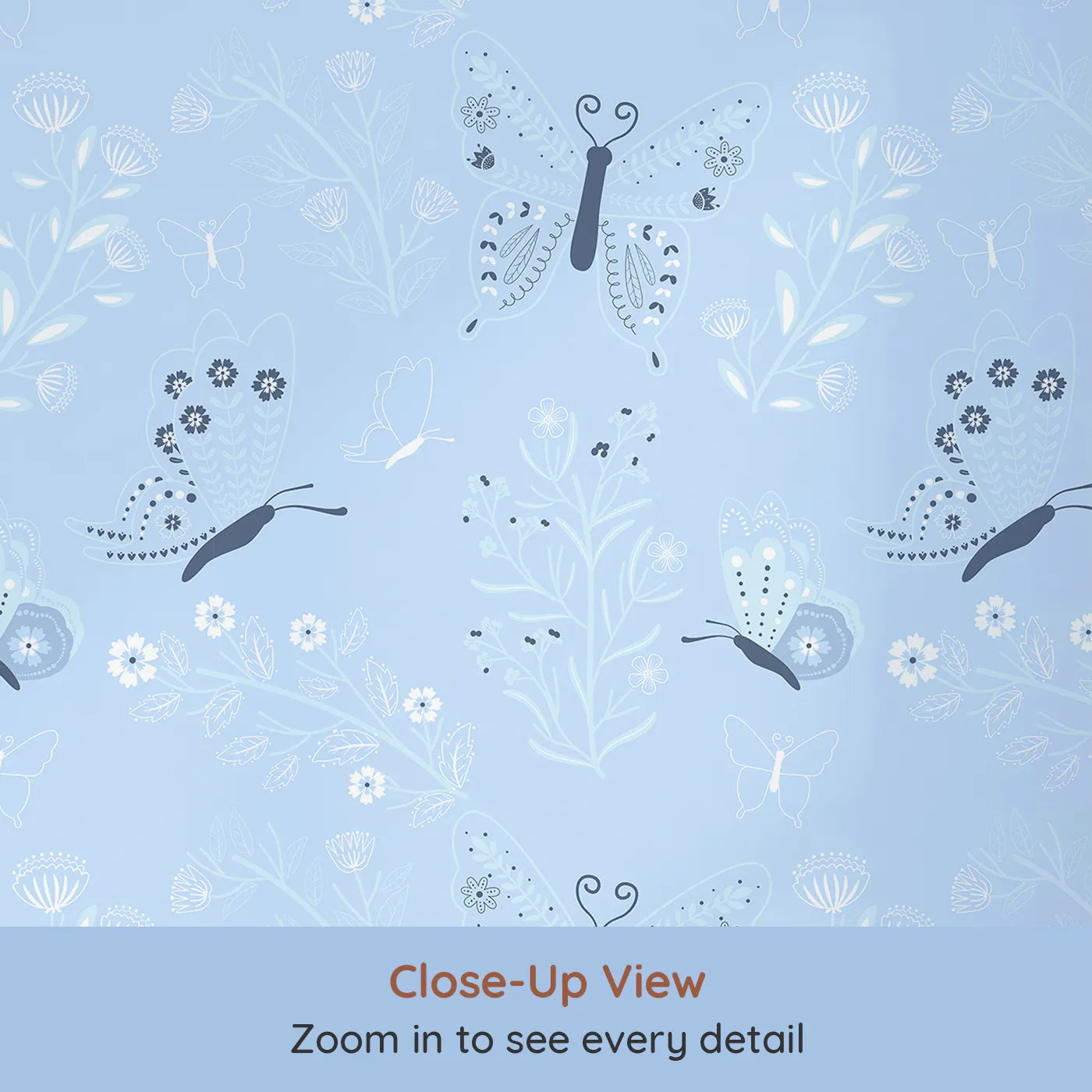 Close-up view of Whimsy Tots' Flutter Garden Butterfly Wallpaper in Sky (W3048B).Playful butterflies and floating florals drift across a soft sky blue.