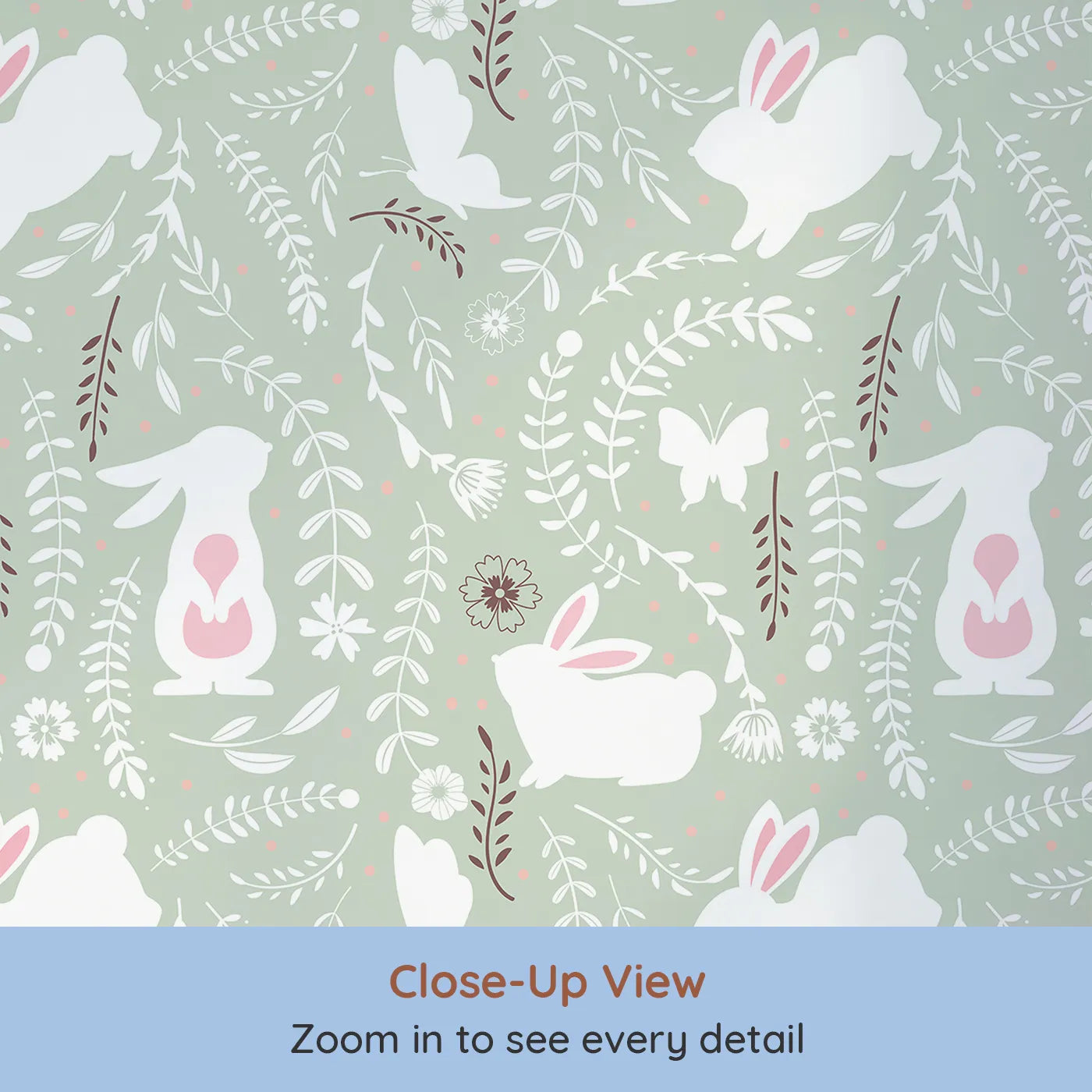 Close-up view of Whimsy Tots' Bunny Hideaway Meadow Wallpaper in Mint Green (W3050D).White bunnies and fluttering butterflies dance through soft greenery and blossoms.