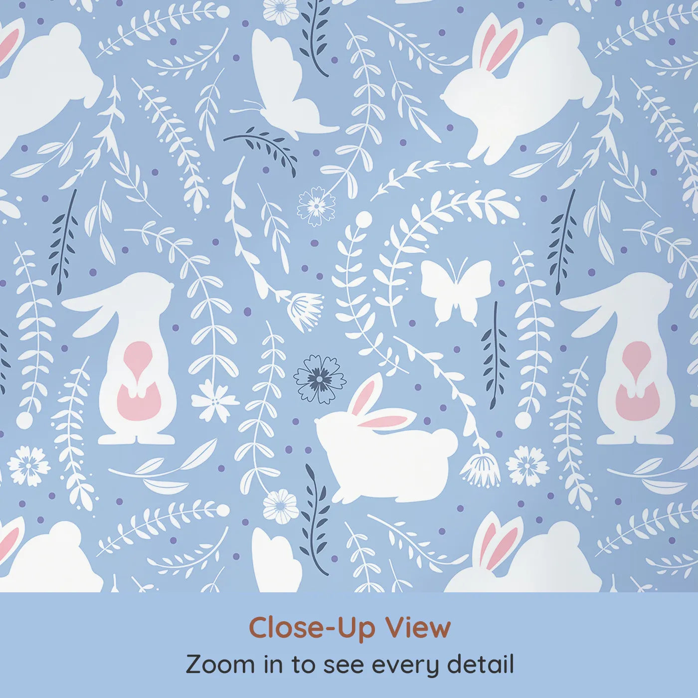 Close-up view of Whimsy Tots' Bunny Hideaway Meadow Wallpaper in Bluebell (W3050E).Bunnies, butterflies, and vines pop against soft twilight blue and playful purple dots.