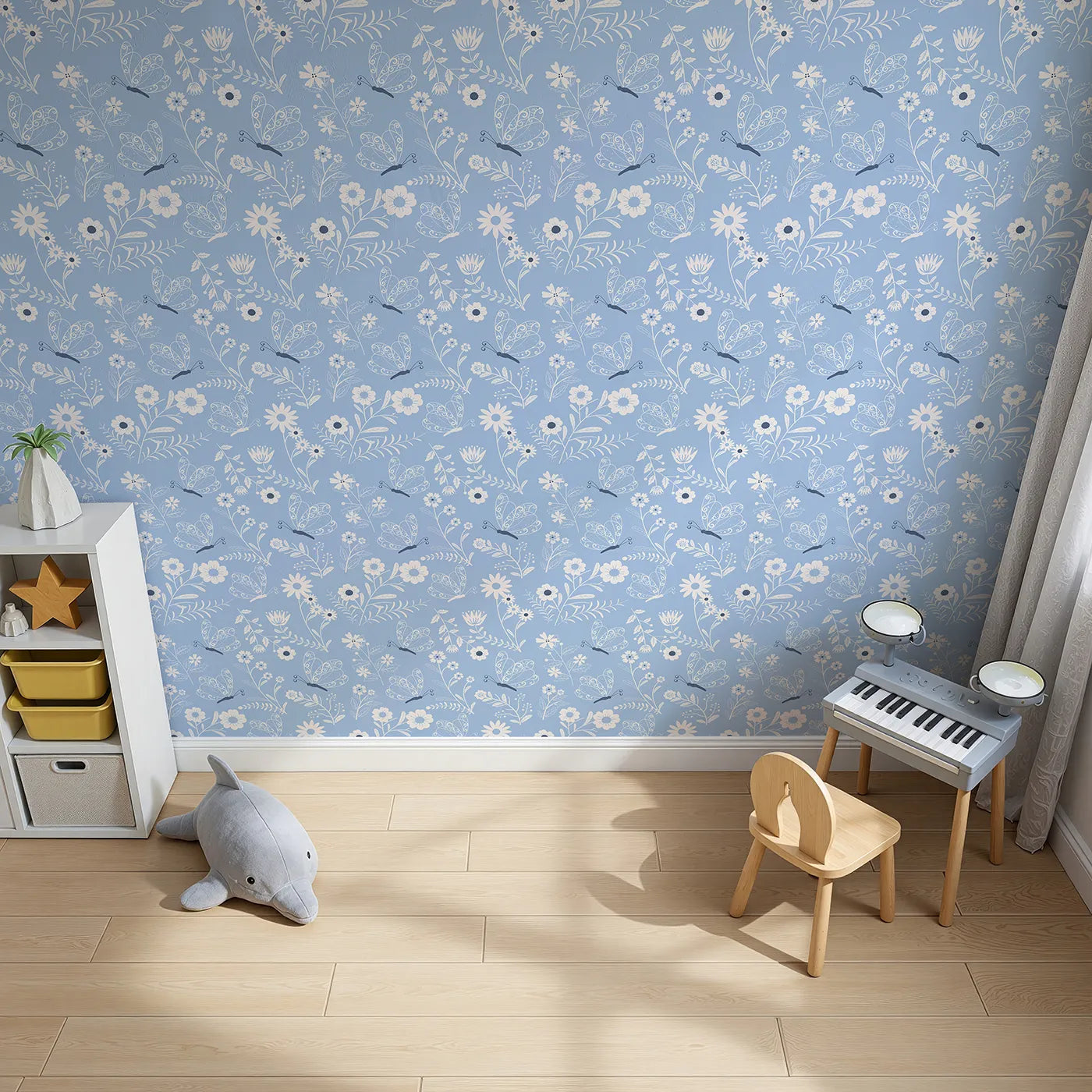 Top-Down view of Whimsy Tots' Floral Flutter Butterfly Wallpaper in Powder Blue (W3056B).Curly butterflies and sketchy florals bloom on a soft powder blue field.