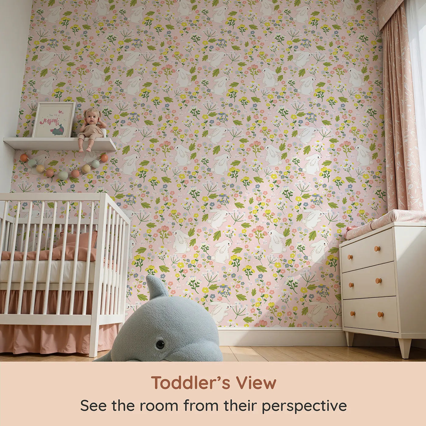 Whimsy Tots Bloomy Bunny Meadow Wallpaper in Petal Pink (W3061B) from your child's view.White bunnies frolic through blooming pink fields of daisies and wildflowers.