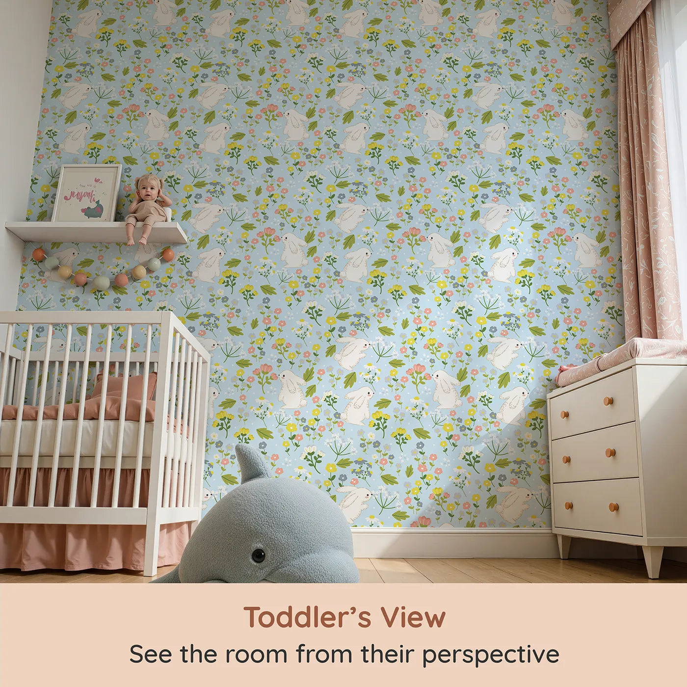 Whimsy Tots Bloomy Bunny Meadow Wallpaper in Bluebell Sky (W3061D) from your child's view.Fluffy white bunnies play among wildflowers on a bright blue sky.