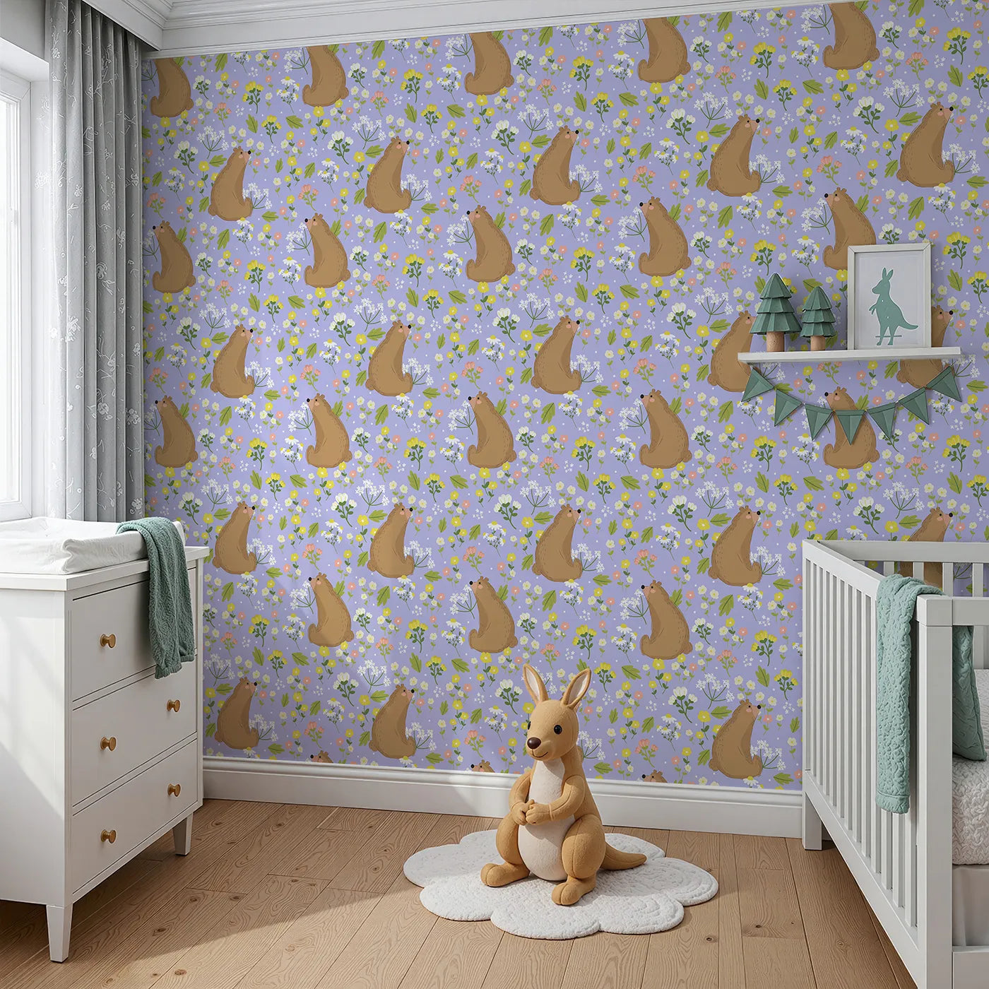 Angled view of Whimsy Tots' Blossom Bear Meadow Wallpaper in Lavender Mist (W3062E).Gentle bears and pastel florals bloom over a soothing lavender sky.