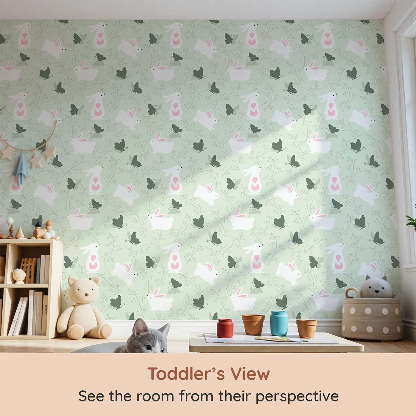 Whimsy Tots Bunny and Butterfly Meadow Wallpaper in Mint Green (W3074B) from your child's view.White bunnies and forest butterflies play among gentle green twigs.