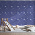 Front view of Whimsy Tots' Midnight Dino Parade Wallpaper in Navy Blue