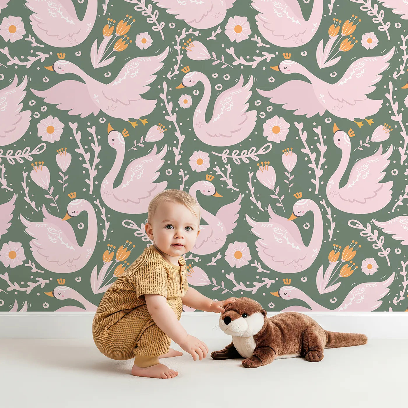 Lovely child standing in front of Whimsy Tots Starlit Swan Ballet Wallpaper in Sage Green with swan, crown, flower, bow, leaf in design.