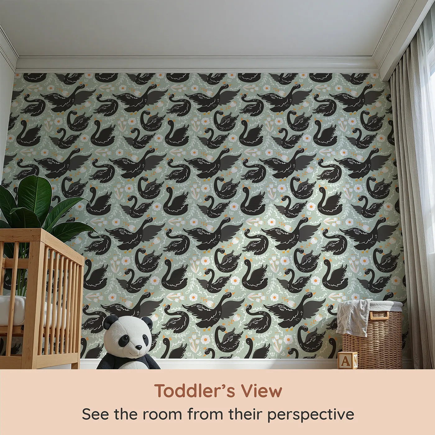 Whimsy Tots Regal Swan Parade Wallpaper in Sage Green (W3087D) from your child's view.Black swans with tiny crowns drift among flowers on a soft green breeze.