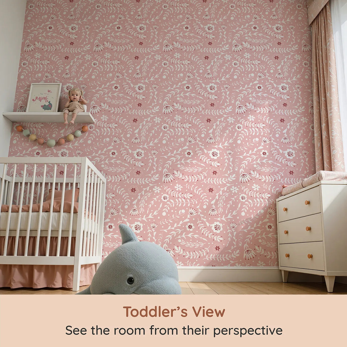 Whimsy Tots Spring Meadow Whispers Wallpaper in Blush Pink (W3089A) from your child's view.White blooms and soft vines twirl gently across a rosy pink field.