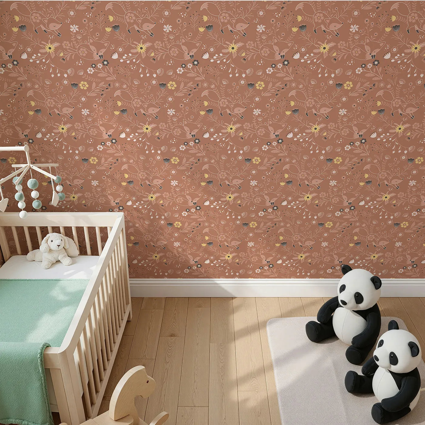 Top-Down view of Whimsy Tots' Wildflower Fox Dreams Wallpaper in Terracotta (W3095).Playful foxes stretch and snooze among blooming wildflowers.