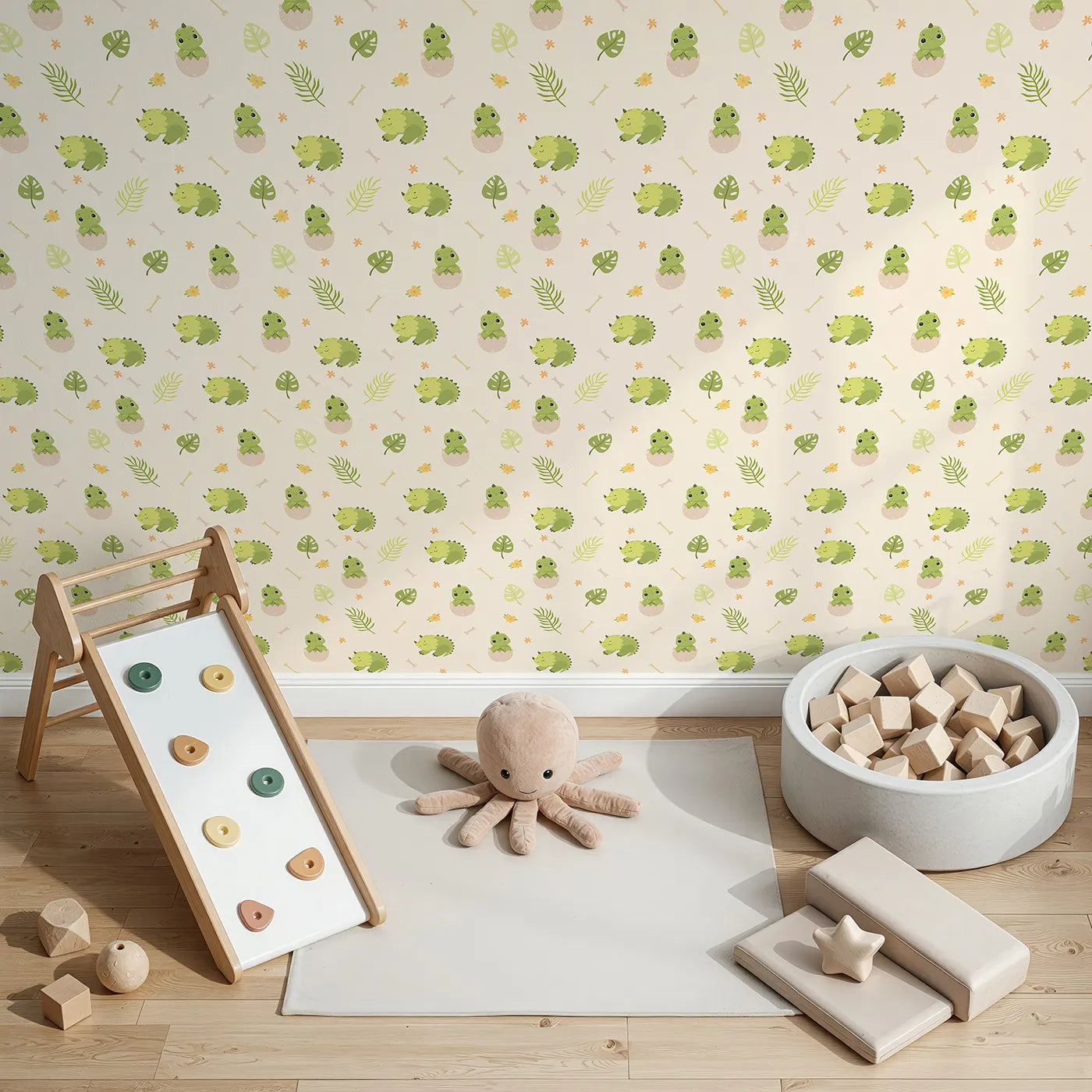 Top-Down view of Whimsy Tots' Hatching Dino Friends Wallpaper in Warm Cream (W3109B).Baby dinosaurs and leafy greens make every day a gentle adventure.