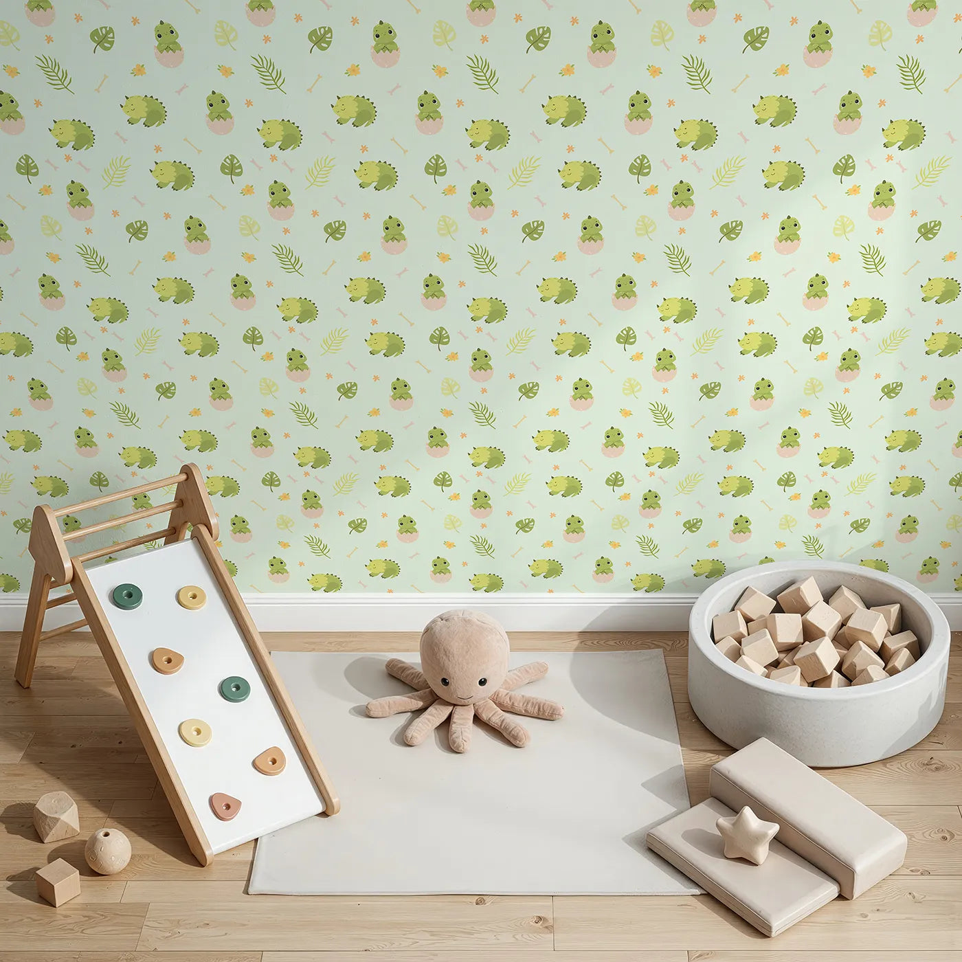 Top-Down view of Whimsy Tots' Hatching Dino Friends Wallpaper in Mint Meadow Green (W3109C).Leafy greens and baby dinos bring soft adventure to every wall.