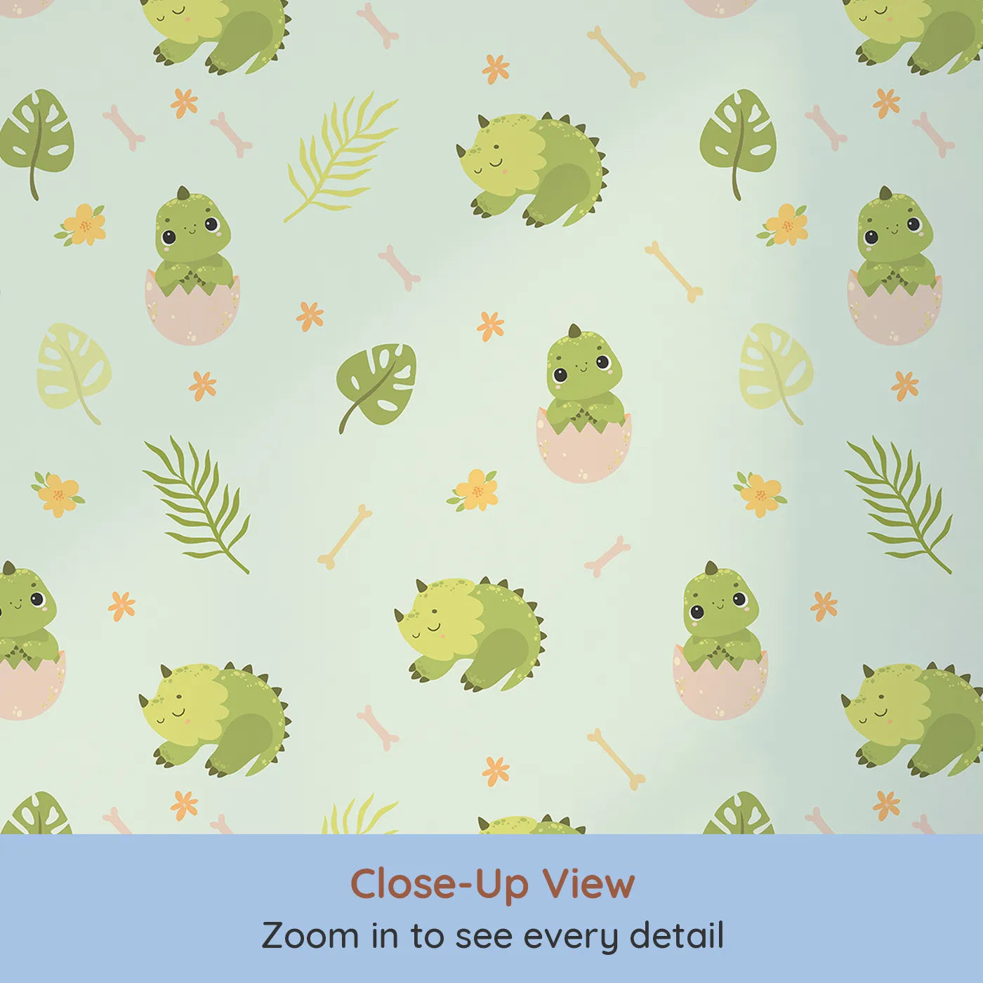Close-up view of Whimsy Tots' Hatching Dino Friends Wallpaper in Mint Meadow Green (W3109C).Leafy greens and baby dinos bring soft adventure to every wall.