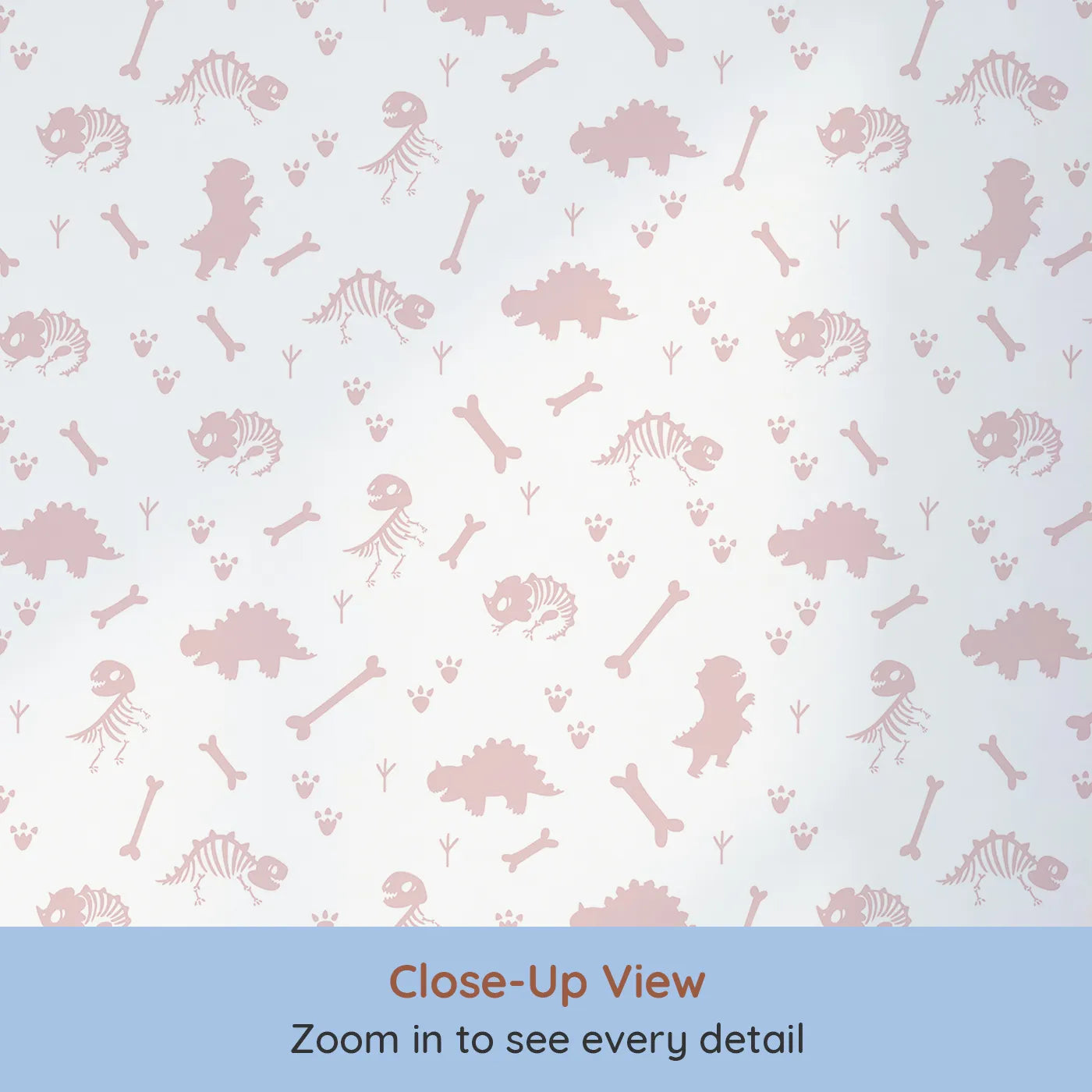 Close-up view of Whimsy Tots' Fossil Roar Parade Wallpaper in Dusty Rose Pink (W3110B).Dino bones and prints wander softly across a pale pink landscape.