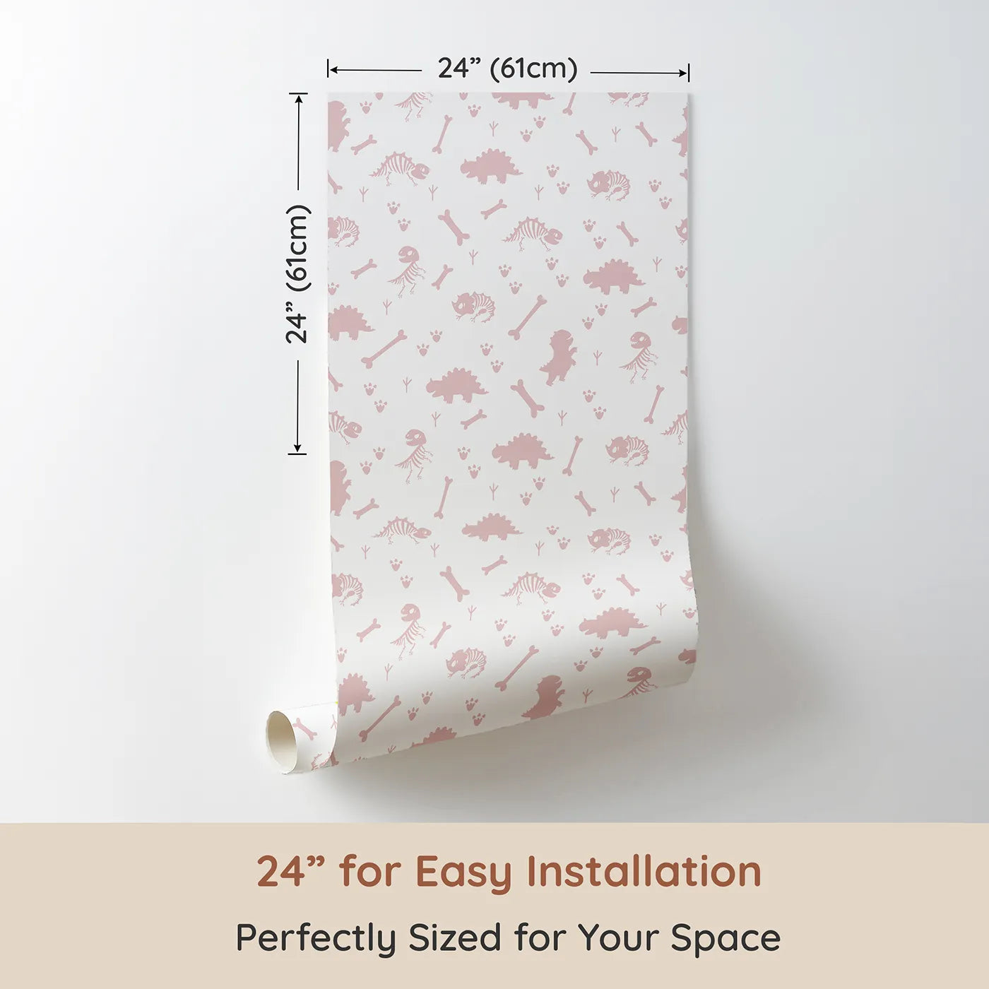 Dimension view of Whimsy Tots Fossil Roar Parade Wallpaper in Dusty Rose Pink (W3110B). Printed in 24-inch-wide panel for easy installation. Dino bones and prints wander softly across a pale pink landscape.