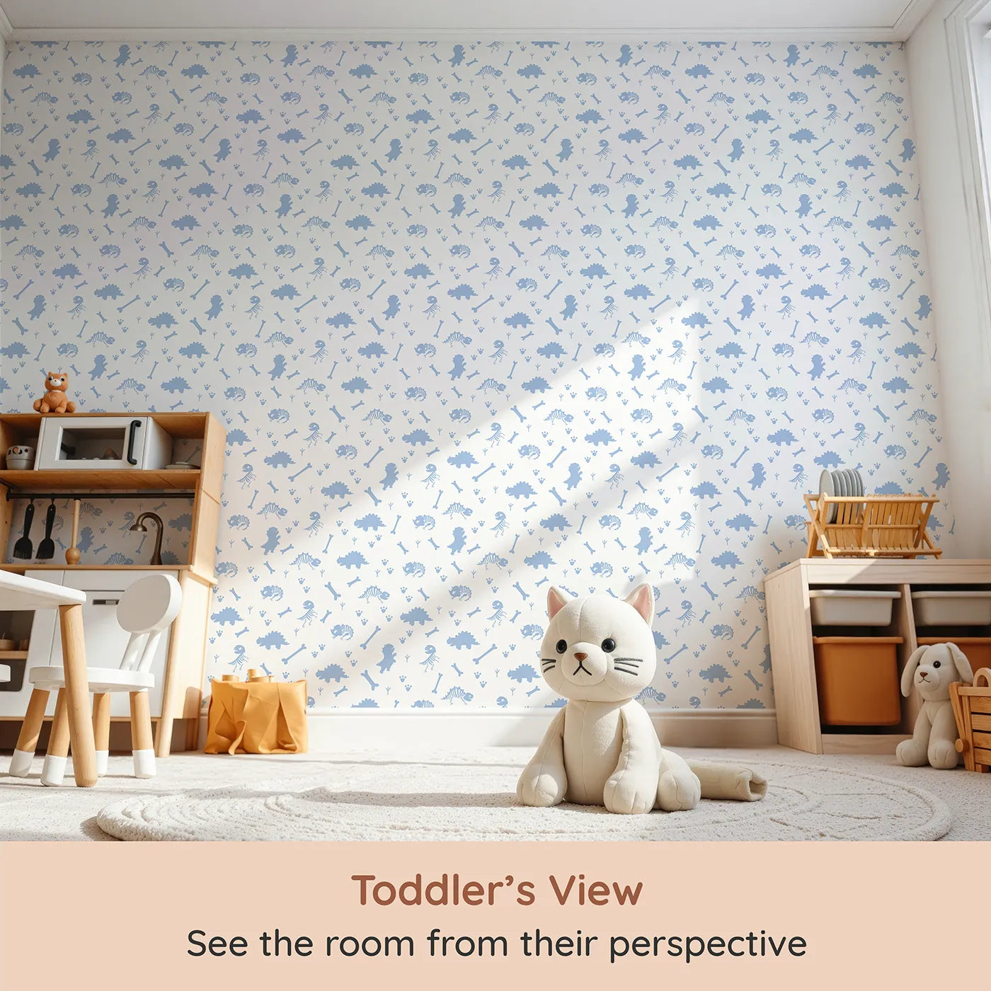 Whimsy Tots Fossil Roar Parade Wallpaper in Blue Dust (W3110D) from your child's view.Soft fossil prints and tiny tracks invite prehistoric play.