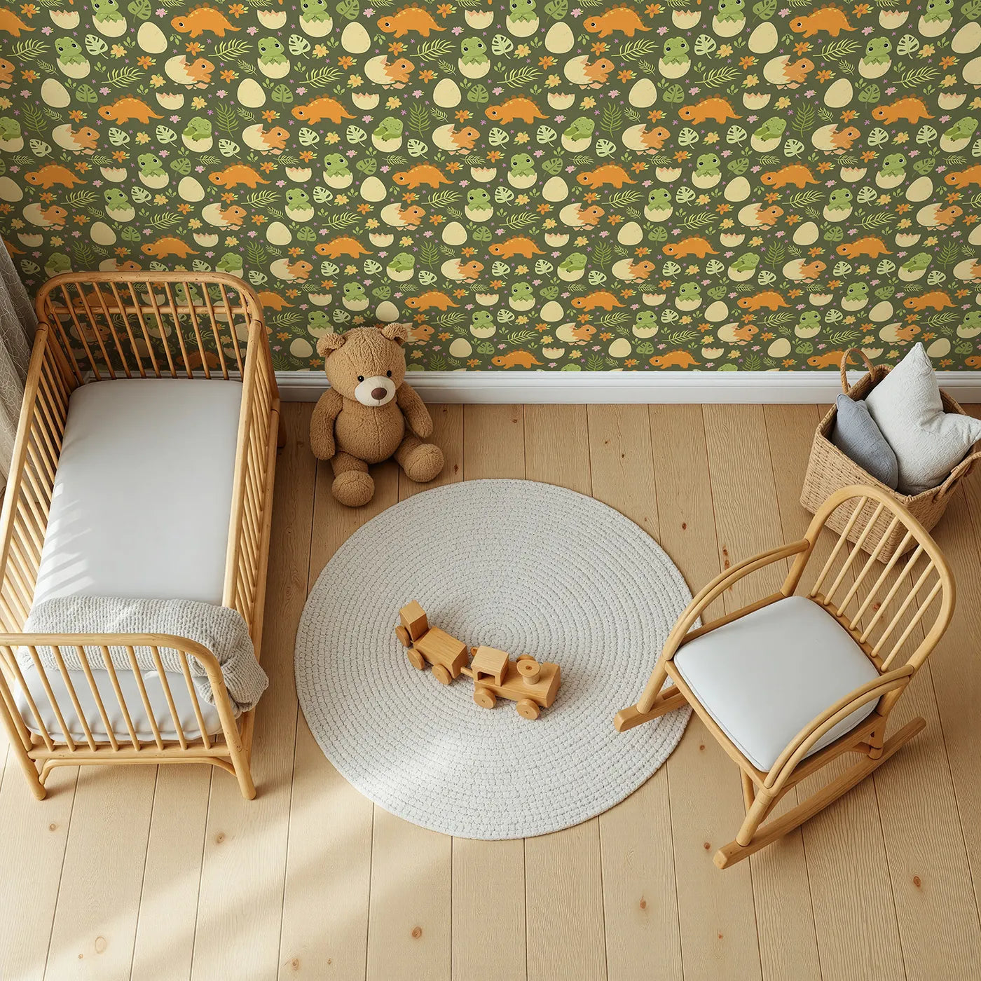 Top-Down view of Whimsy Tots' Hatchling Dino Garden Wallpaper in Olive Fern Green (W3116A).Smiling dino babies hatch among lush leaves and cheerful blooms.