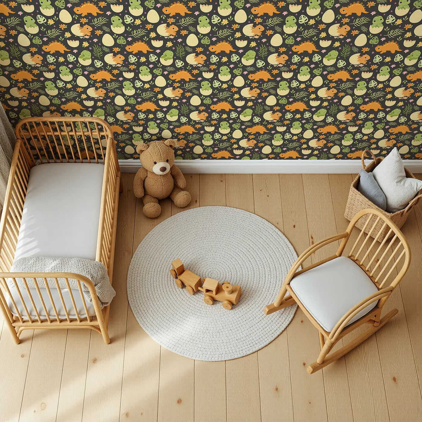 Top-Down view of Whimsy Tots' Hatchling Dino Garden Wallpaper in Charcoal Nest Gray (W3116E).Bright dino babies and florals shine against moody charcoal tones.