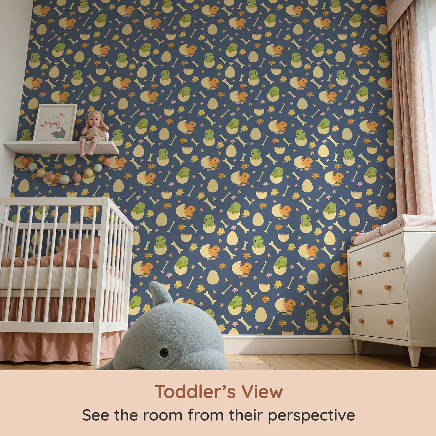 Whimsy Tots Hatchling Dino Parade Wallpaper in Dusty Denim (W3117D) from your child's view.Eggshell dinos and scattered flowers float over soft denim blue.