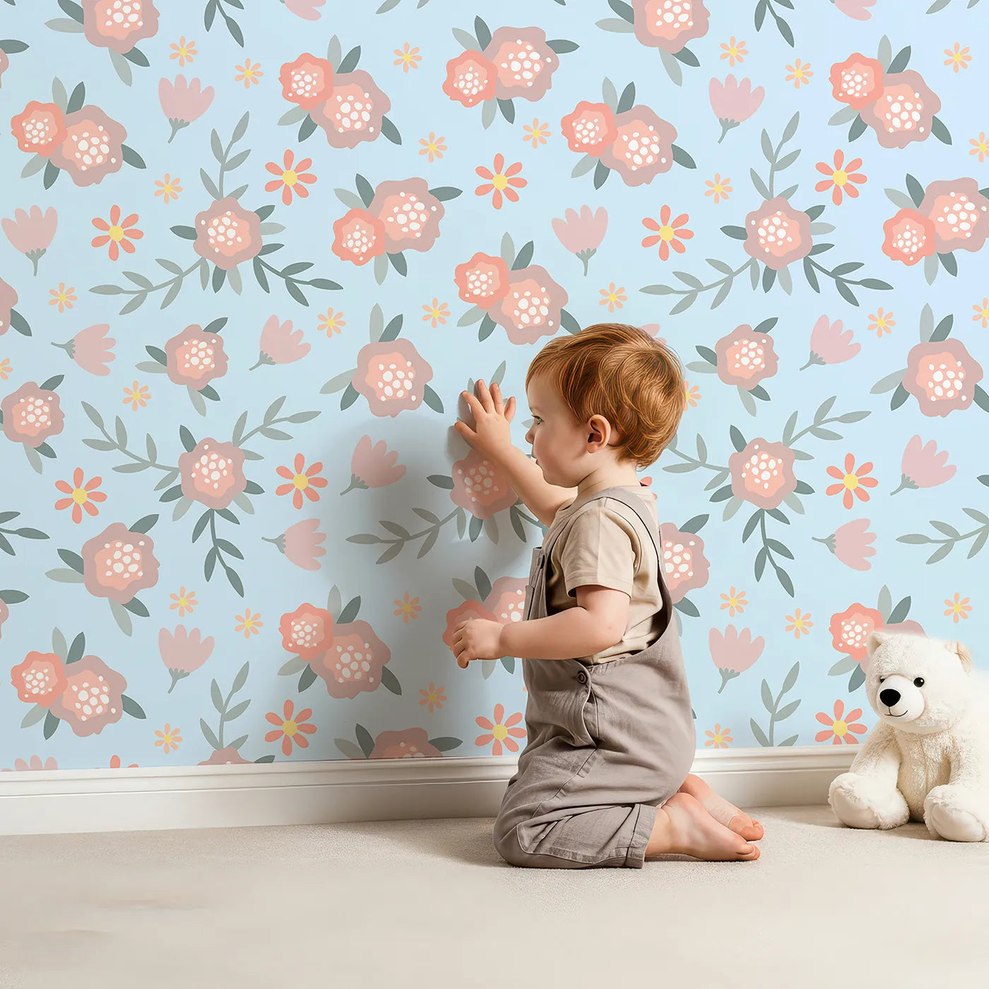 Lovely child standing in front of Whimsy Tots Whispering Peony Garden Wallpaper in Sky Blossom with flower, peony, daisy, leaf in design.