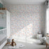 Front view of Whimsy Tots' Floating Botanical Whispers Wallpaper in Soft Feather