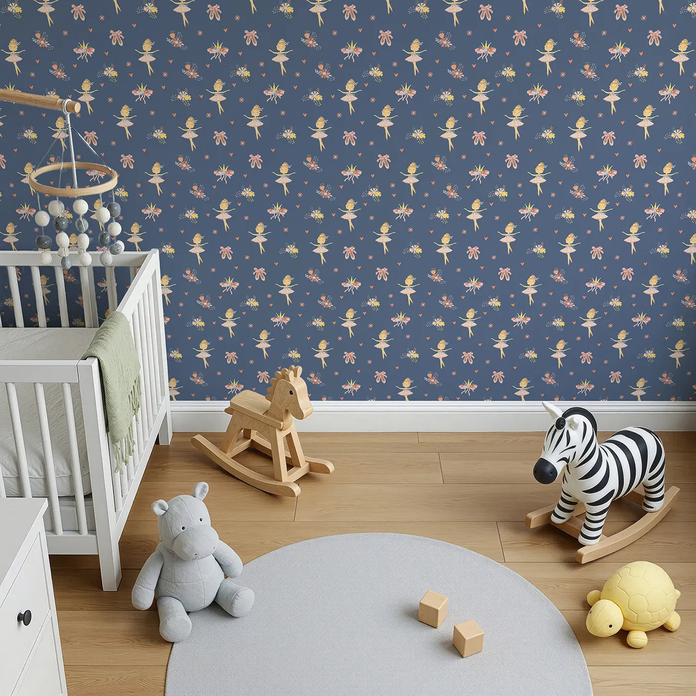 Top-Down view of Whimsy Tots' Blush Ballerina Dreams Wallpaper in Starlight Stage (W3124C).Soft tutus and crowns glide across a moonlit navy backdrop.