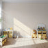 Front view of Whimsy Tots' Gentle Pebble Dots Wallpaper in Butter Beige