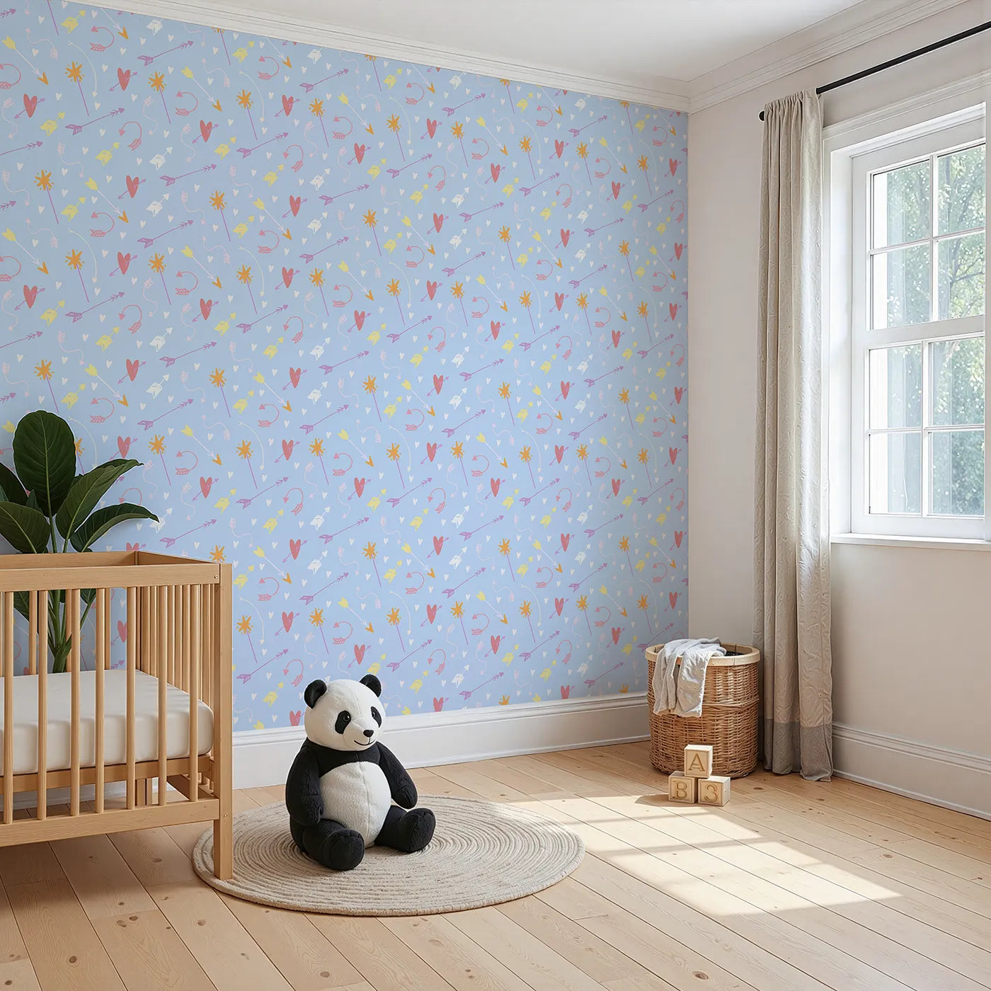 Angled view of Whimsy Tots' Cupids Arrow Parade Wallpaper in Sky Blue (W3143D).Pastel hearts and arrows swirl across a playful blue sky.