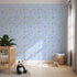 Front view of Whimsy Tots' Cupids Arrow Parade Wallpaper in Sky Blue
