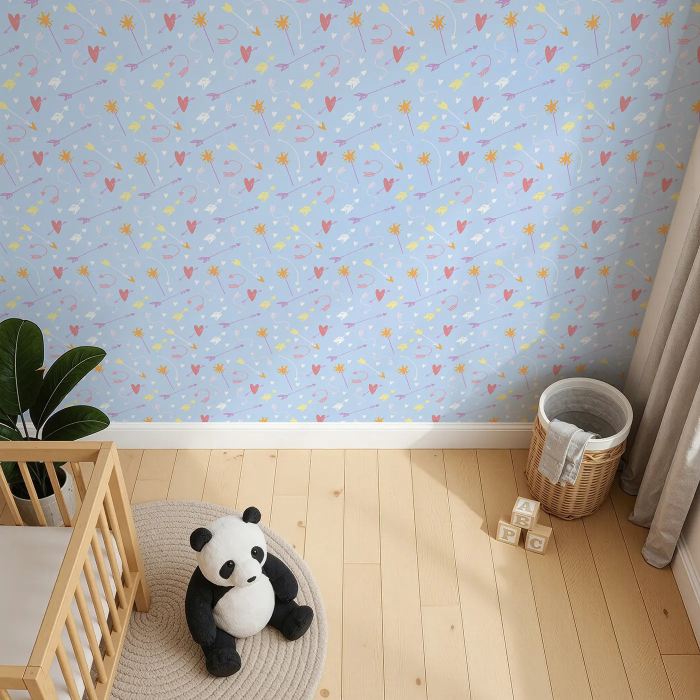 Top-Down view of Whimsy Tots' Cupids Arrow Parade Wallpaper in Sky Blue (W3143D).Pastel hearts and arrows swirl across a playful blue sky.