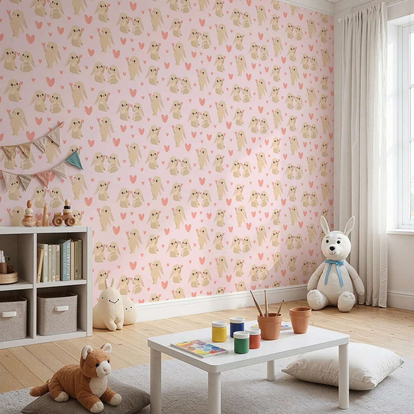 Angled view of Whimsy Tots' Heartful Bunny Parade Wallpaper in Blush Pink (W3159B).Lovable bunnies hold pink hearts across a gentle blush sky.