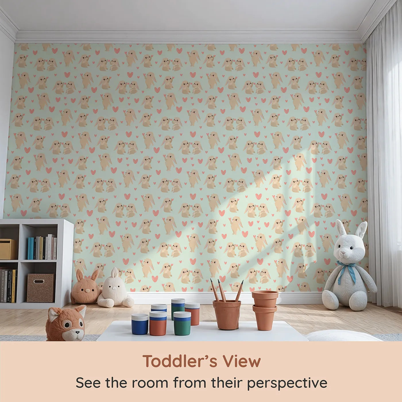 Whimsy Tots Heartful Bunny Parade Wallpaper in Mint Green (W3159D) from your child's view.Cuddly rabbits and rosy hearts dance on a fresh mint sky.