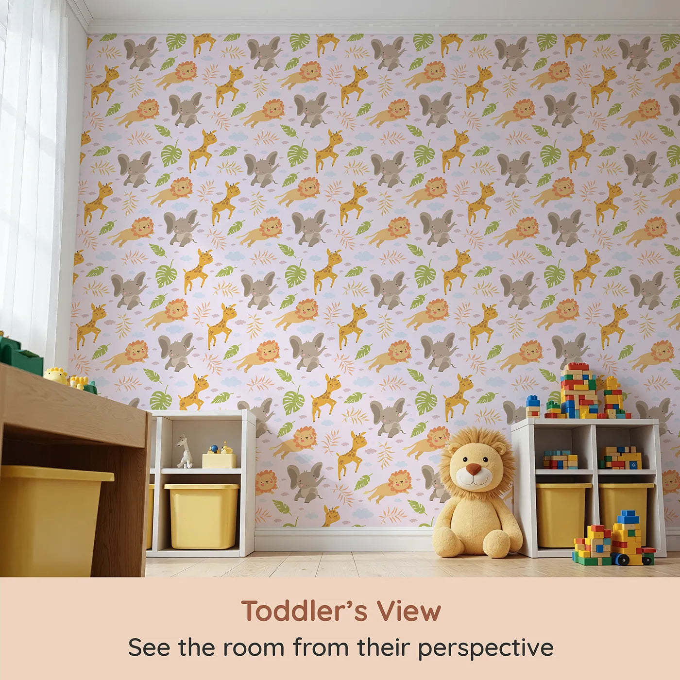 Whimsy Tots Jungle Leaf Pals Wallpaper in Blush Pink (W3186B) from your child's view.Cuddly lions, elephants, and giraffes play beneath leafy skies.