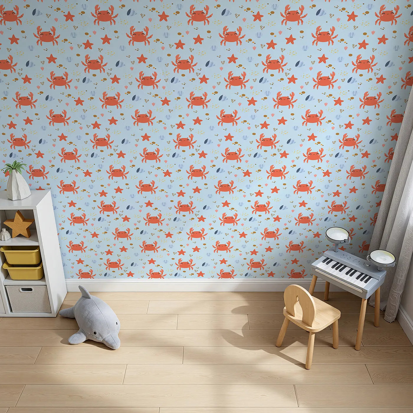 Top-Down view of Whimsy Tots' Crabby Coral Dance Wallpaper in Sky Blue (W3190E).Smiley crabs and playful starfish create a sunny undersea celebration.