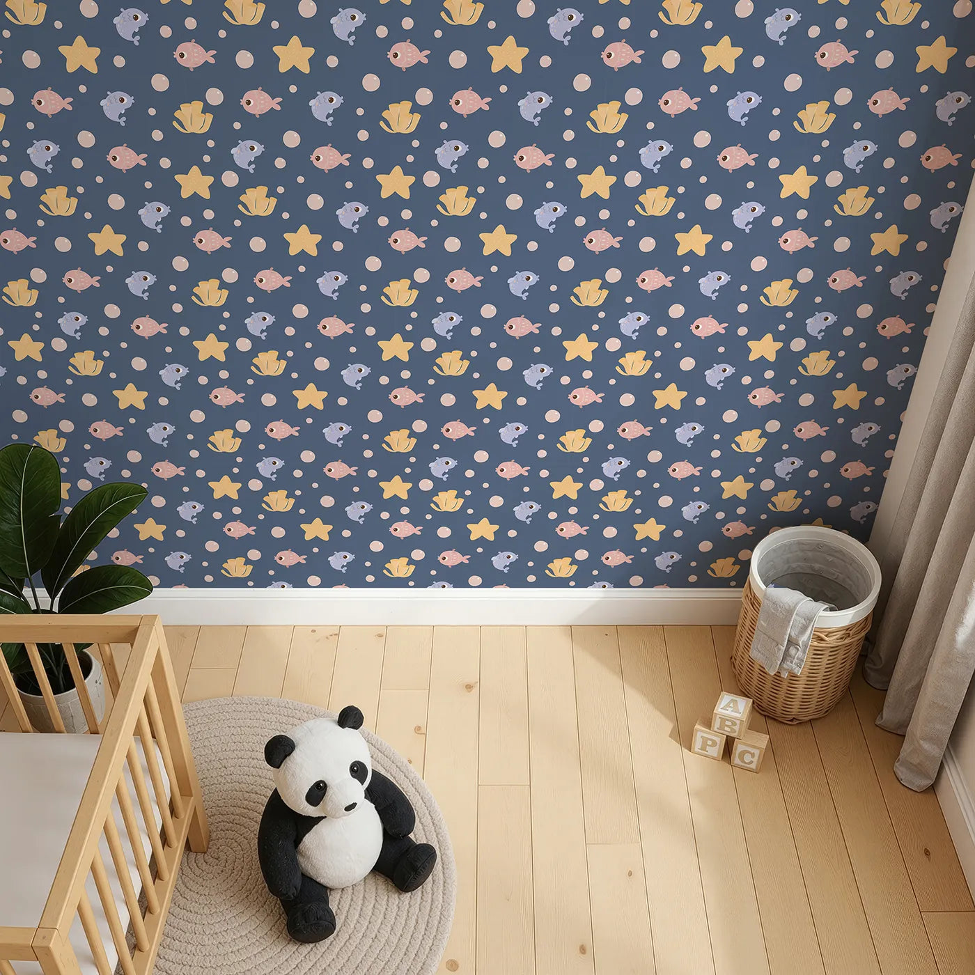 Top-Down view of Whimsy Tots' Bubblefish Coral Drift Wallpaper in Midnight Blue (W3193B).Smiley fish, coral tubes, and sea stars drift softly through bubble-filled seas.