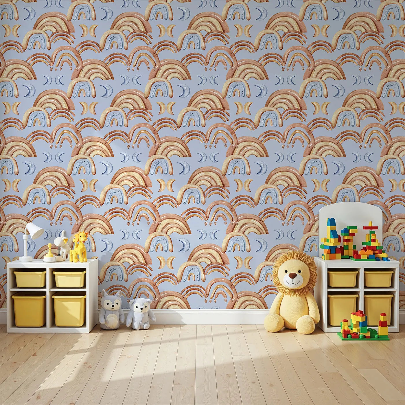 Angled view of Whimsy Tots' Rainbow Moondance Wallpaper in Blue (W3242A).Soothing arcs and soft celestial shapes wrap their world in wonder.