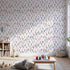 Front view of Whimsy Tots' Tulip Meadow Dots Wallpaper in Blush Pink