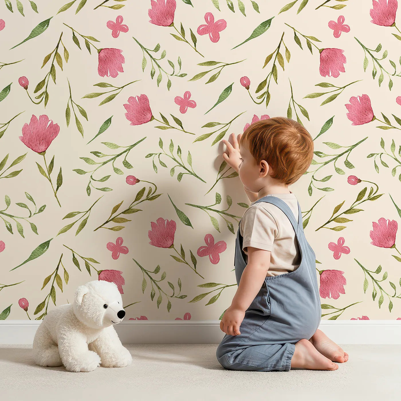 Lovely child standing in front of Whimsy Tots Blushing Petal Tangle Wallpaper in Cream with flower, leaf, petal, vine in design.