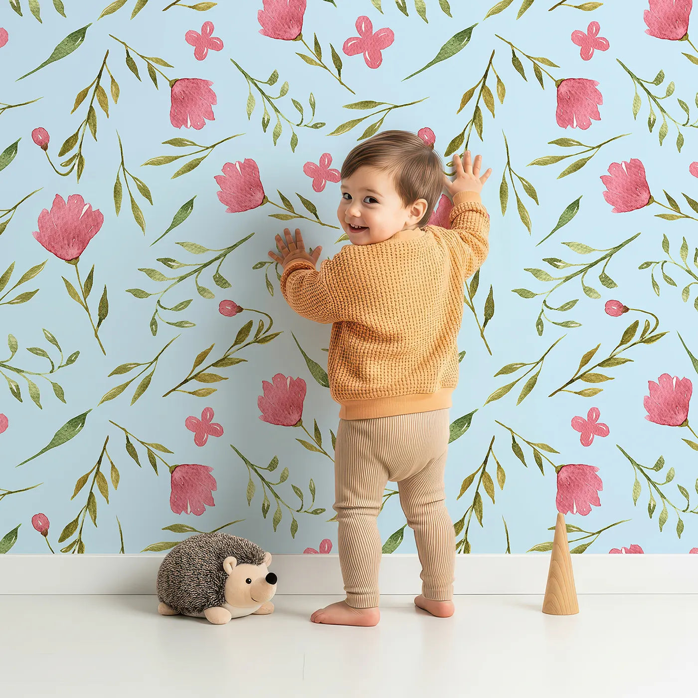 Lovely child standing in front of Whimsy Tots Blushing Petal Tangle Wallpaper in Sky with flower, leaf, petal, vine in design.