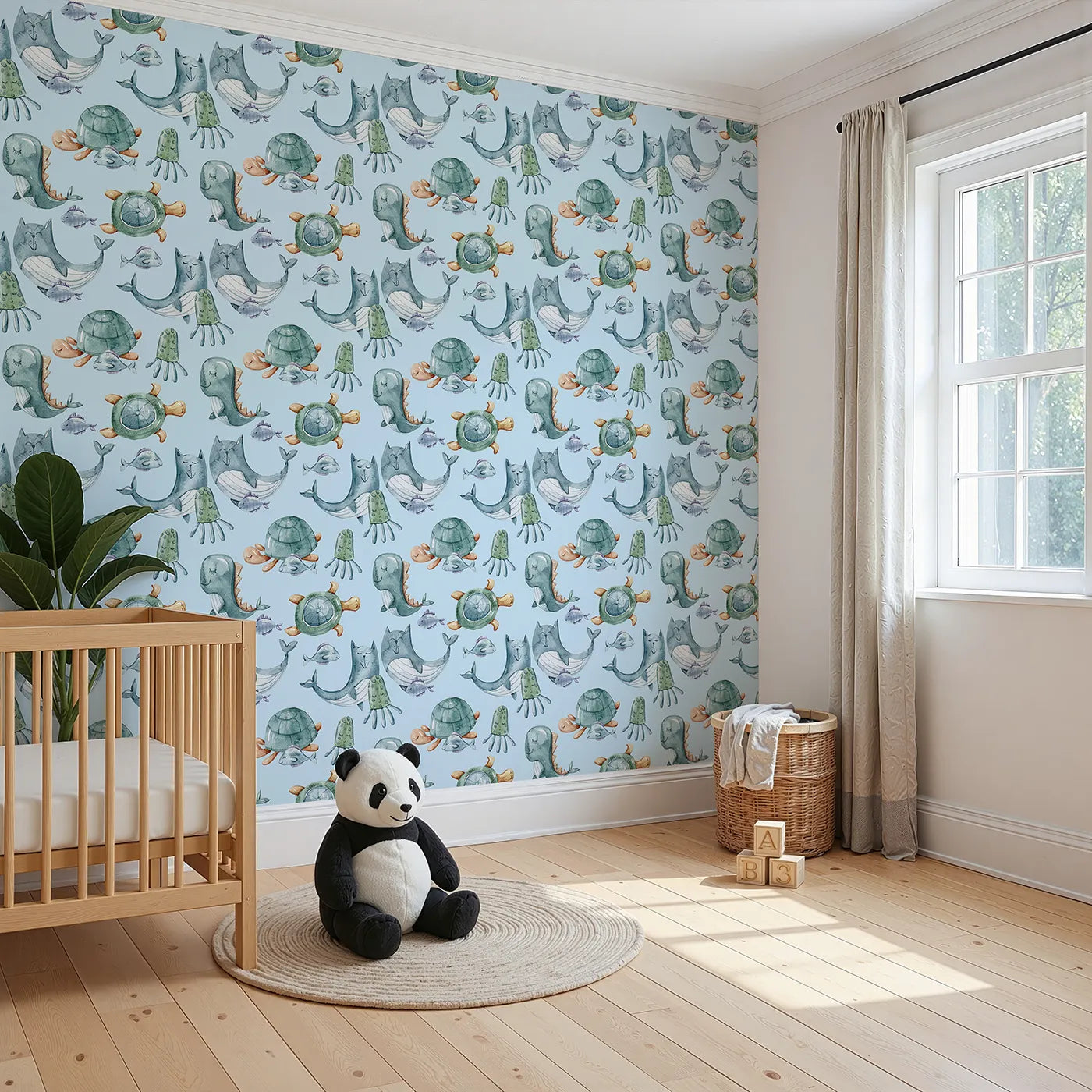 Angled view of Whimsy Tots' Ocean Daydream Creatures Wallpaper in Sky Blue (W3277E).Whales and turtles nap beneath a peaceful blue sea of dreams.