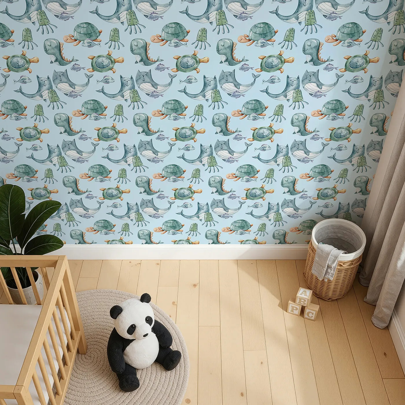 Top-Down view of Whimsy Tots' Ocean Daydream Creatures Wallpaper in Sky Blue (W3277E).Whales and turtles nap beneath a peaceful blue sea of dreams.
