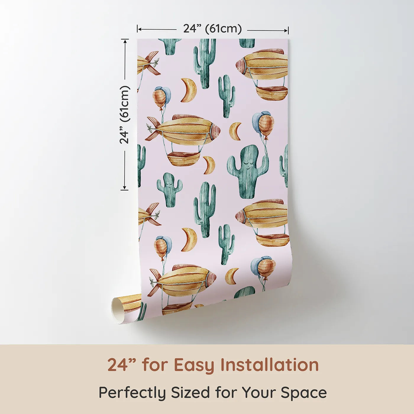 Dimension view of Whimsy Tots Desert Balloon Voyage Wallpaper in Blush Pink (W3278B). Printed in 24-inch-wide panel for easy installation. Airships drift through a pink sky above smiling cacti and soft golden moons.