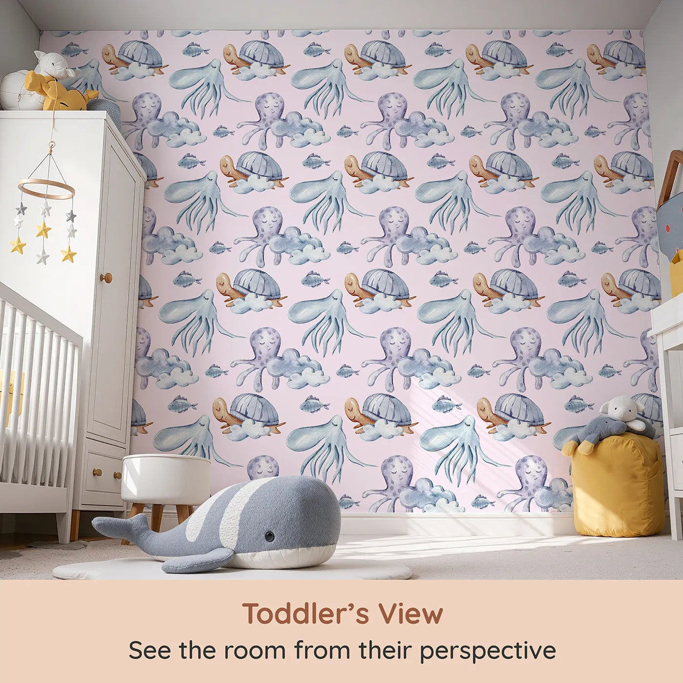 Whimsy Tots Ocean Dreams Wallpaper in Blush Pink (W3281B) from your child's view.Soft sea creatures float gently through pink skies and puffy clouds.