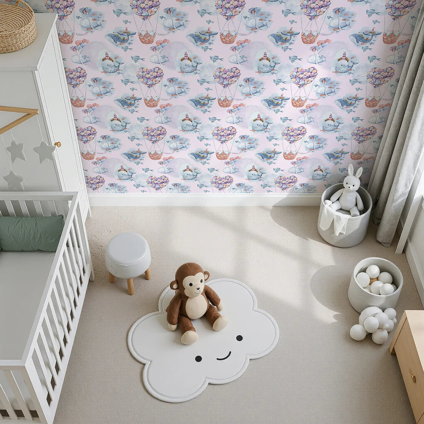 Top-Down view of Whimsy Tots' Whales of Love Wallpaper in Blush Pink (W3282B).Whales drift through blush skies, carrying heart balloons and love.