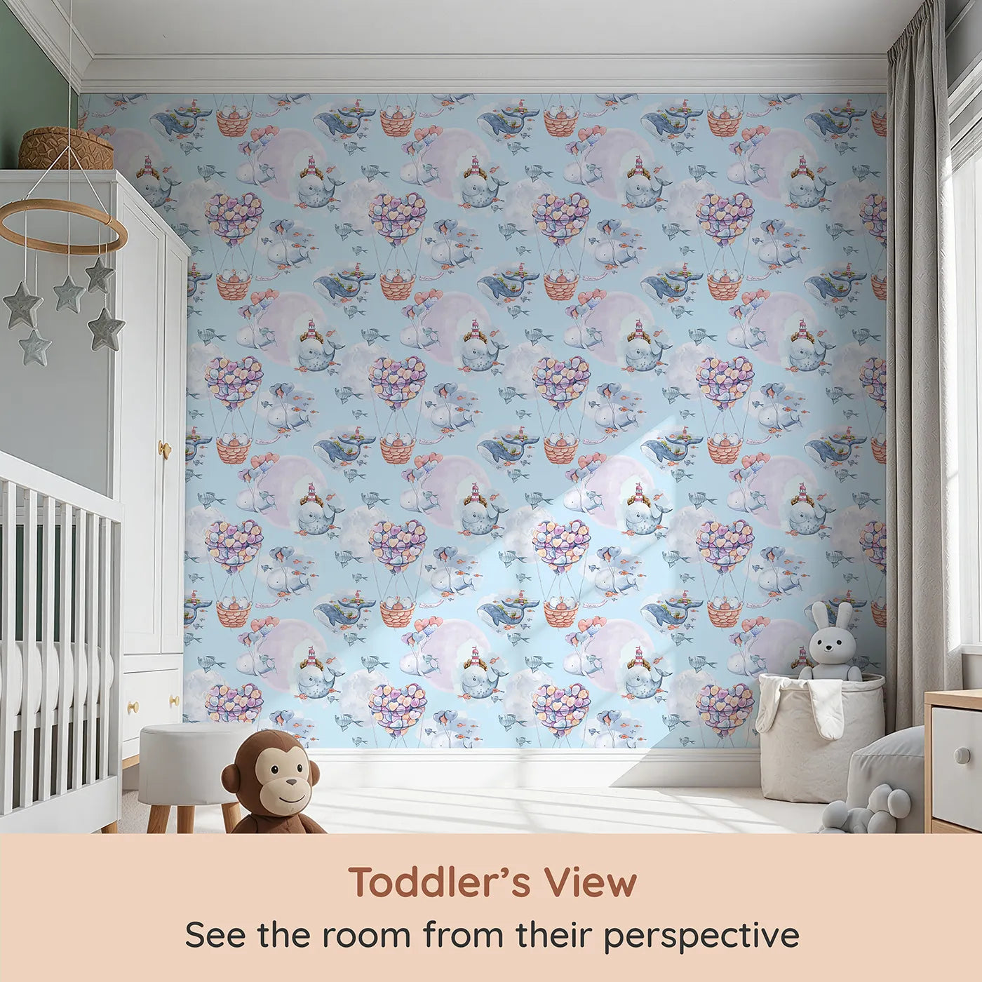 Whimsy Tots Whales of Love Wallpaper in Blue (W3282E) from your child's view.A soft blue sky filled with whales, fish, and pastel hearts.