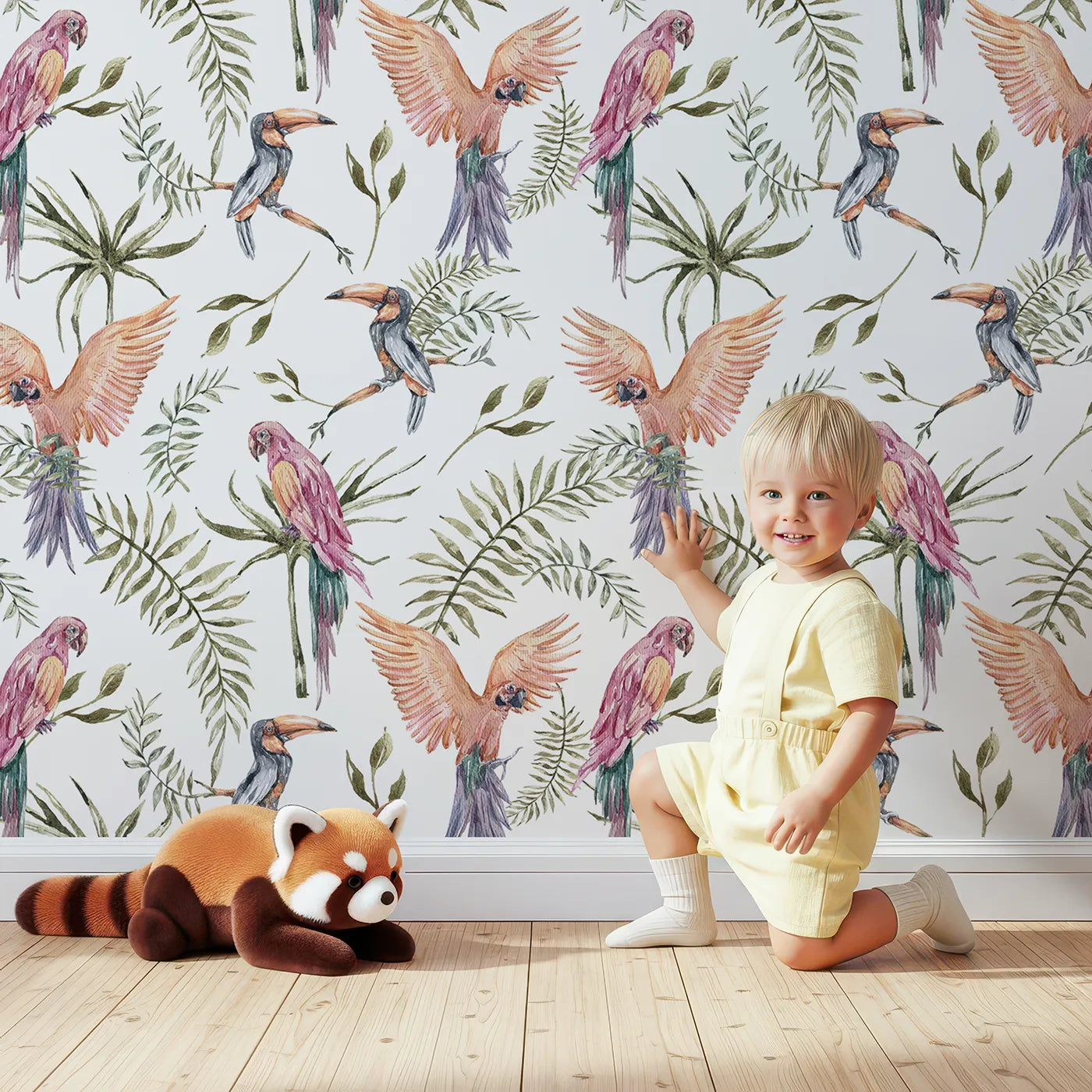 Lovely child standing in front of Whimsy Tots Tropical Bird Canopy Wallpaper in White with parrot, toucan, palm, leaf in design.