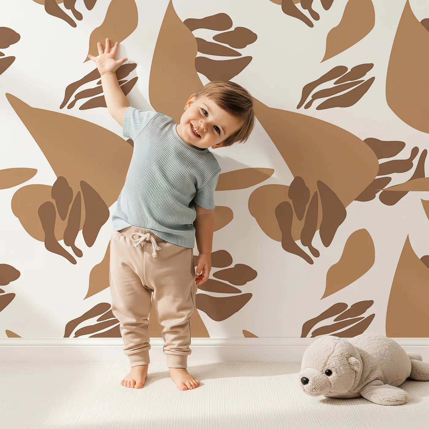 Lovely child standing in front of Whimsy Tots Abstract Desert Pods Wallpaper with pod, shape, abstract, desert in design.