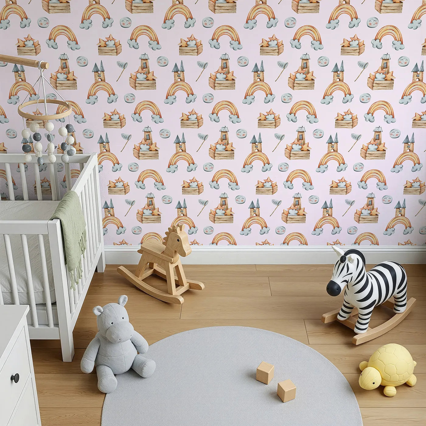 Top-Down view of Whimsy Tots' Rainbow Castle Dreams Wallpaper in Pink (W3314B).Smiling moons and cozy castles float among pastel dreams.